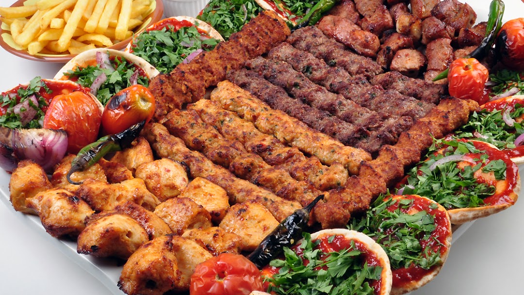 selection of grilled meat, chicken and lamb